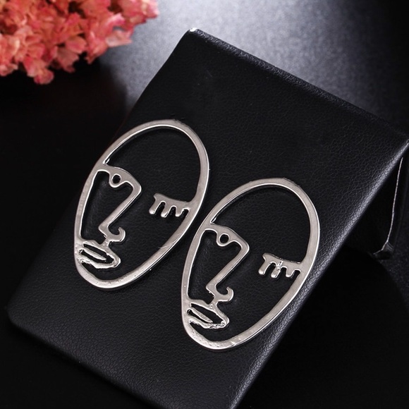 GlitzBlitz Boutique Jewelry - 2/$20! Silver Abstract Visage Earrings